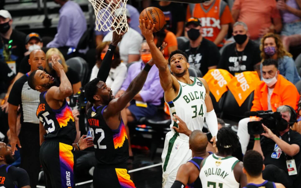 雄鹿多点开花险胜太阳赢得赛点 再胜一战NBA称王